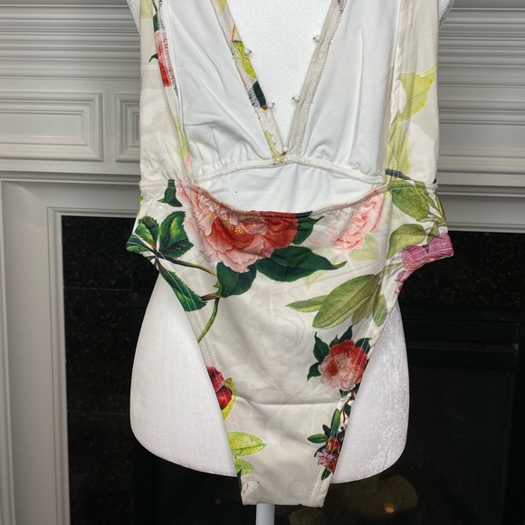 Rococo Sand Beaded Floral One Piece Swimsuit
Floral Swimsuit - Picture 5 of 13
